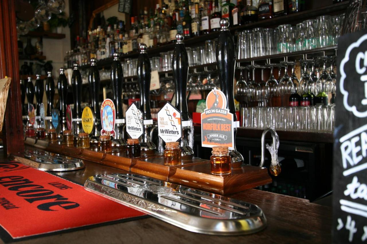The Red Lion Hotel 크로머 외부 사진 Beer taps in a pub